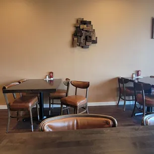 More seating and some of the wall decor in Hale&apos;s Kitchen