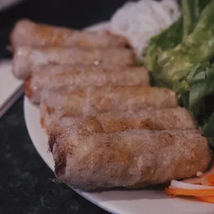 a plate of meat and vegetables