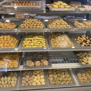 a display case full of cookies and pastries