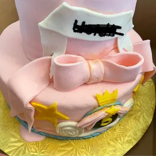 The fondant was melting the minute I received the cake. And just look at the extremely unprofessional work on the cake!!! Embarrassing!!!