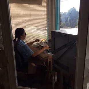 Glass artist working away as part of the artist in residence program!