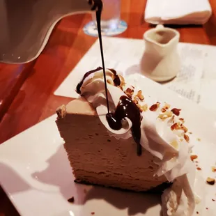 The famous mud pie with warm chocolate syrup