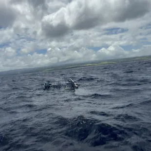 Cage set in the ocean .