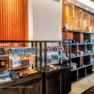 Halekulani brand items. Chocolates, coffee, macadamia nuts. Clothing + housewares. The Halekulani custom Coconut Cake candle.