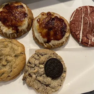 a variety of pastries in a box