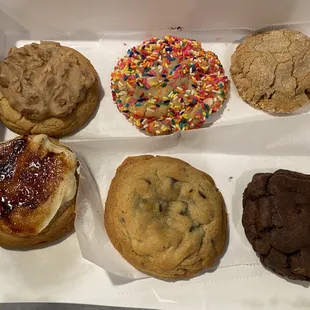 a variety of pastries in a box