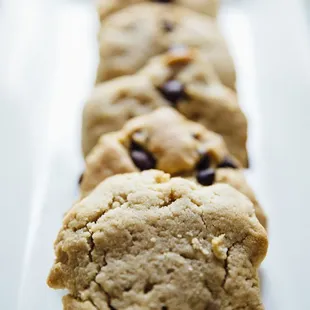 a row of chocolate chip cookies