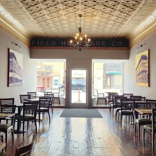 Tin ceiling and rustic flooring which is, I believe, original to this historic building.