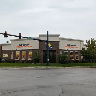 the outside of a half day cafe