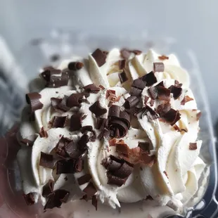 a hand holding a dessert