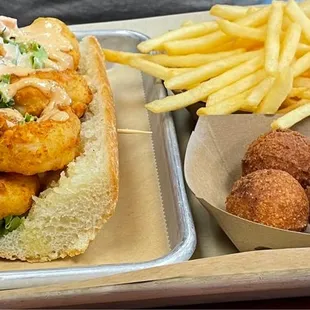 Po' Boy and fries, bread was fantastic soft on the inside crispy on the out and shrimp were big and seasoned.