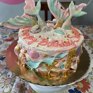 Sue made the birthday cake and I added all the fondant mermaid toppers. Delicious cake!