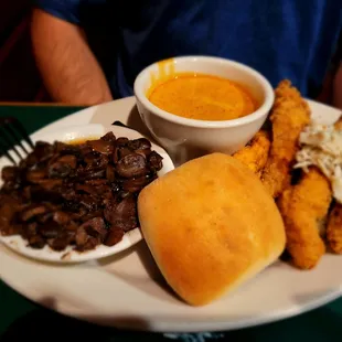 Catfish with the same sauce they put on the Cajun pasta and mushrooms