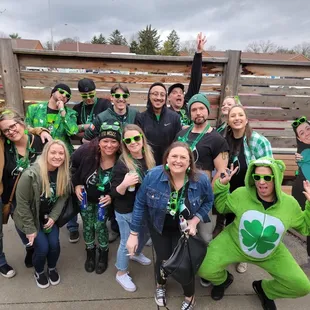 a group of people dressed in st patrick's day costumes