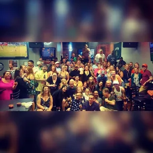 a group of people posing for a picture