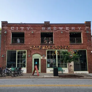 a brick building on a street corner