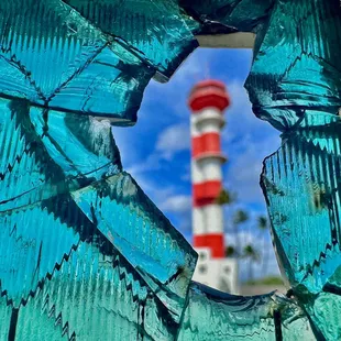 See the bullet holes in the glass at the Pearl Harbor Aviation Museum.