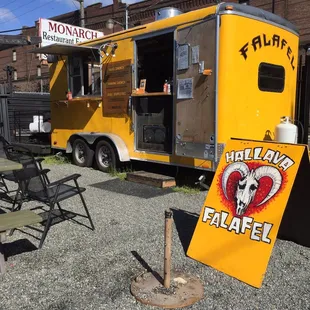 a yellow food truck