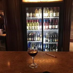 a glass of wine and cheese