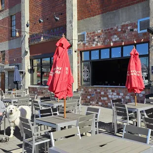 tables and umbrellas outside a restaurant