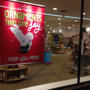 The frons of the Hallmark store decorated on December 23