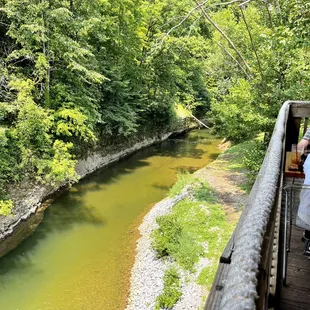 two people on a bridge