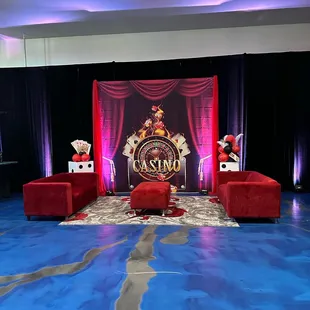 Pieces I rented-  Black Velvet Draping, Red Sofas and Ottoman and Carpet