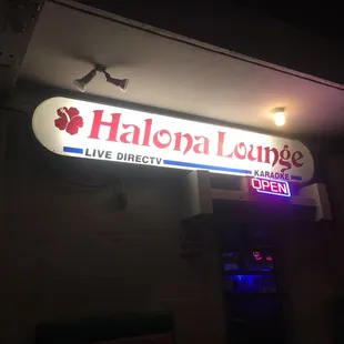 a neon sign for a restaurant