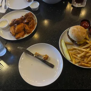 Wings, a burger and fries.
