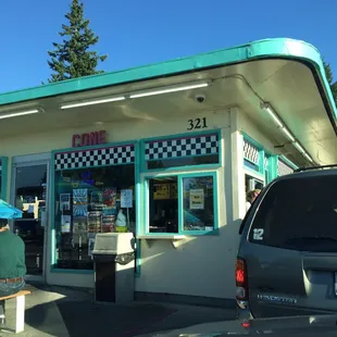 Drive-up/walk-up window, a couple tables out front