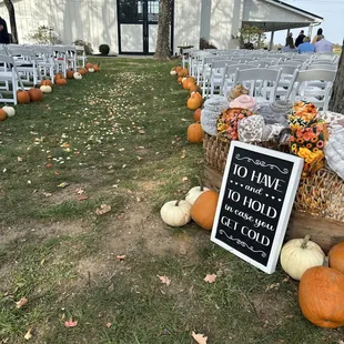 Pumpkins and petals down the aisle