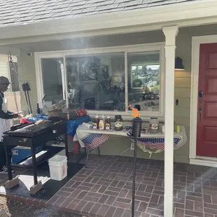 a man standing outside of a home