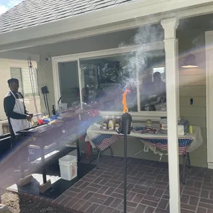 a man standing in front of a house