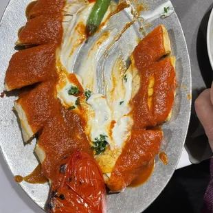 Beyti Kebab: &quot;Ground beef grilled on skewer and served wrapped in lavash bread and topped with tomato sauce and yogurt&quot;.  Outstanding!