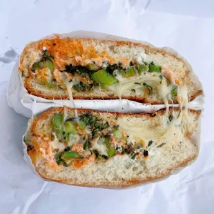 Praise Cheezus Sandwich - love this sandwich&apos;s name! Roasted broccolini, fontina, white cheddar, Gruyère, provolone, hot sauce.
