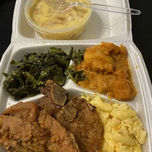 a meal in a styrofoam container
