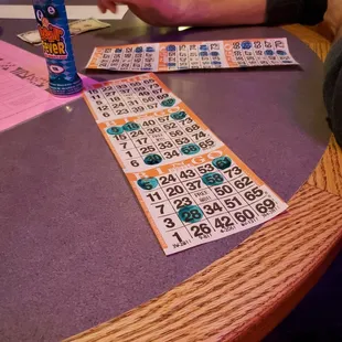 a person playing a game of bingo