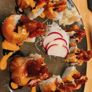 a plate of hama sushi
