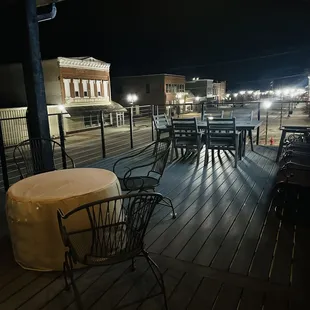 2nd floor deck with fire pit and a view of Main Street