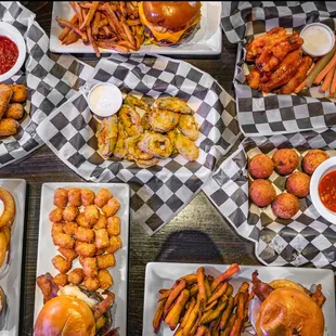 Delicious appetizers! Mac n Cheeses Balls, Fried Jalapeños, Mozzarella Sticks and Chicken Tenders. All made in house and to order