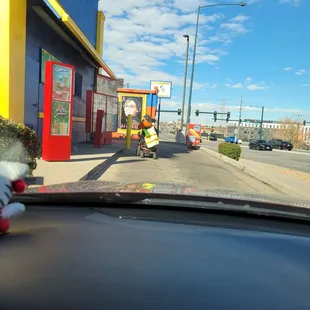 a stuffed animal on the dashboard of a car