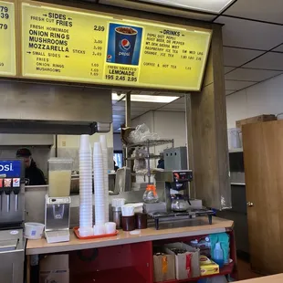menus and prices on the counter