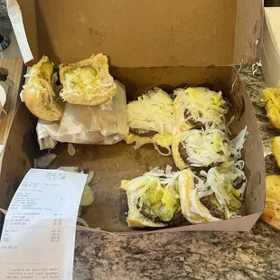 a box of hamburgers and a receipt