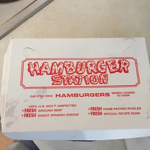 a box of hamburgers sitting on a counter