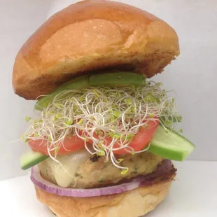 The Great One 99...delicious chicken burger with melted Swiss cheese, avocado, cucumber, tomato, red onion, &amp; alfalfa sprouts