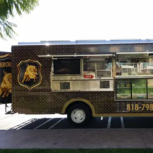 a food truck parked in a parking lot