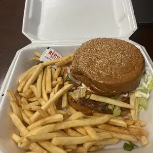 Huge lunch: cheeseburger and fries with pickled jalapenos!