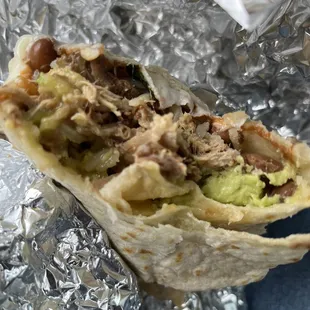 Carnitas burrito is eaten left to right for everything at once!