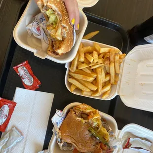 a tray of hamburgers and french fries