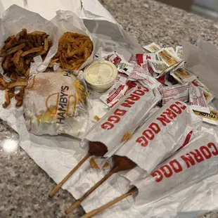 Corn dogs, burger, fries, onion rings